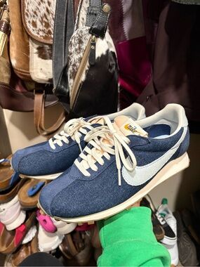 Nike Denim Blue Low-Top Sneakers with White Swoosh